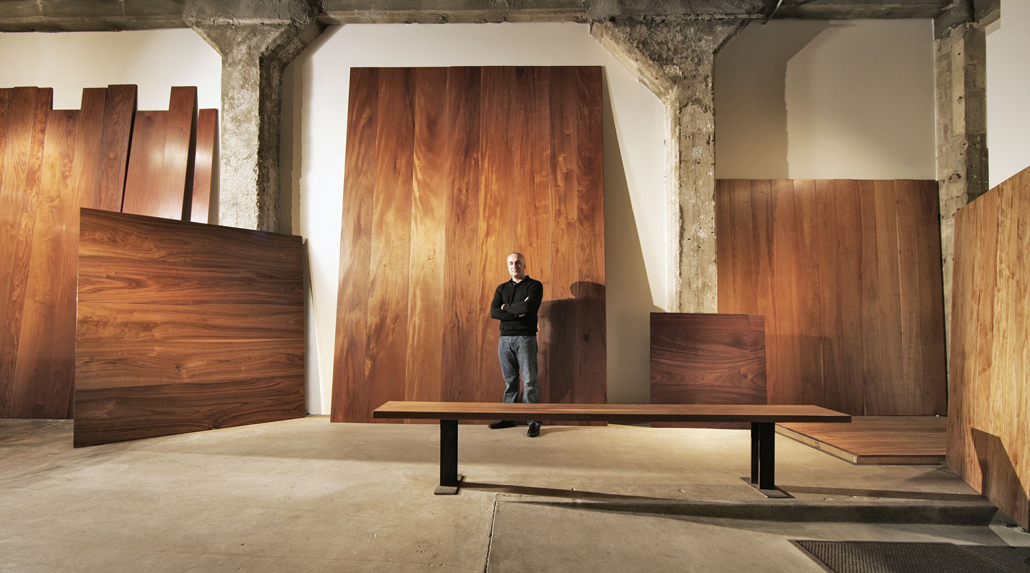 James in a front of extra large wide plank floor panels